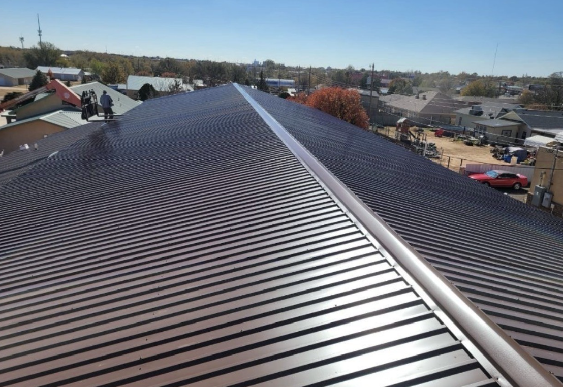 Brown R-panel metal commercial roof