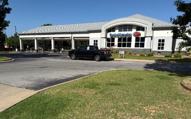 Commercial building with metal roof and covered entry