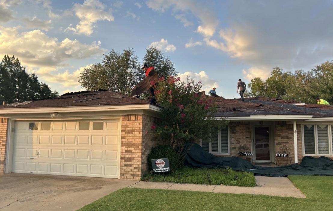 SCR crew installing a new shingle roof in Lubbock